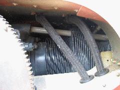 Hoses from oil cooler to back of doghouse, seen through front cowling air intake IMG_3131.JPG